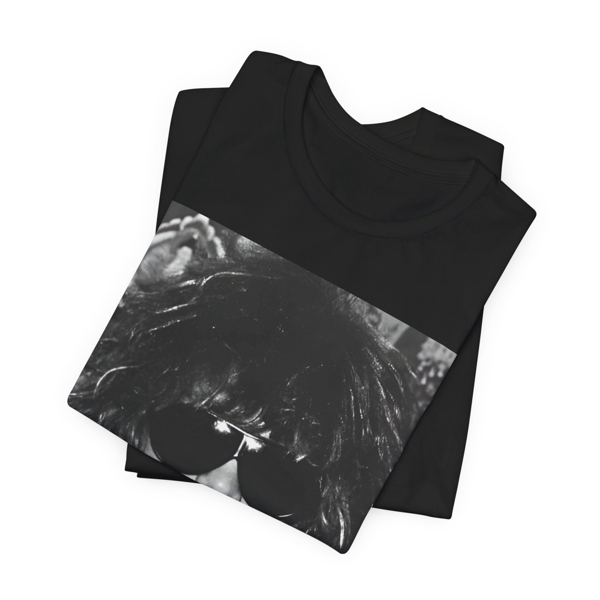 A black graphic t-shirt featuring a graphic or photo of Bon Jovi in a backstage setting.