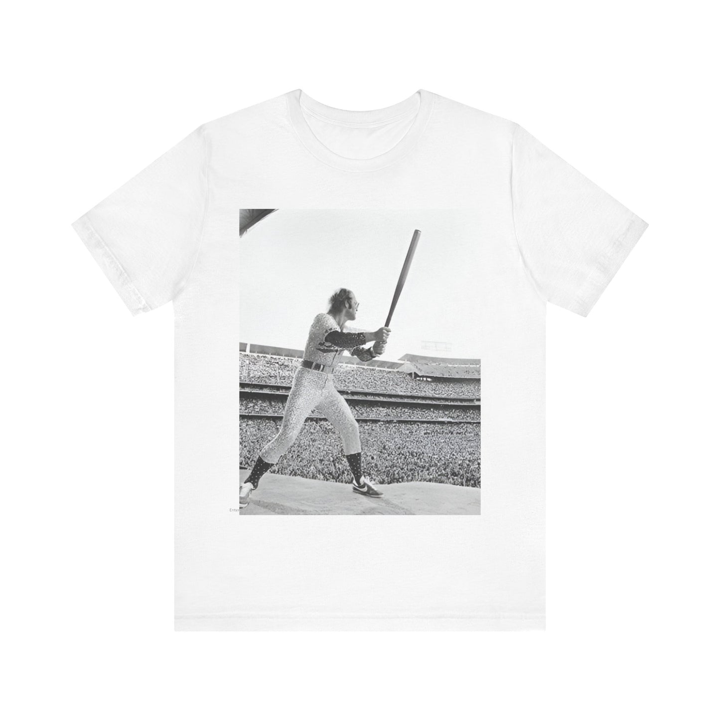 A black graphic t-shirt featuring a black and white graphic or photo related to Elton John's 1975 tour in America.