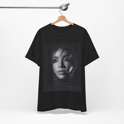 A black graphic t-shirt featuring a black and white portrait photo of Tinashe.