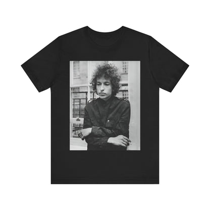 A black graphic t-shirt featuring a black and white graphic of Bob Dylan from the folk revival era.