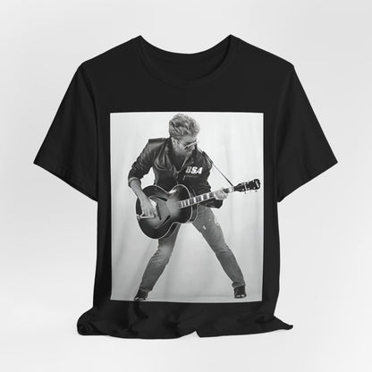 A black graphic t-shirt featuring a graphic of George Michael with a guitar.