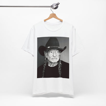 A black graphic t-shirt featuring a graphic of Willie Nelson with his iconic guitar 'Trigger'.