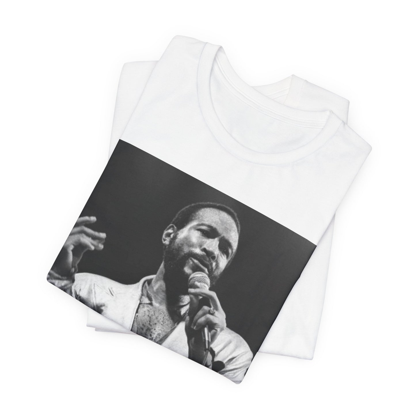 A black graphic t-shirt featuring a retro black and white photo or graphic of Marvin Gaye performing live on stage.