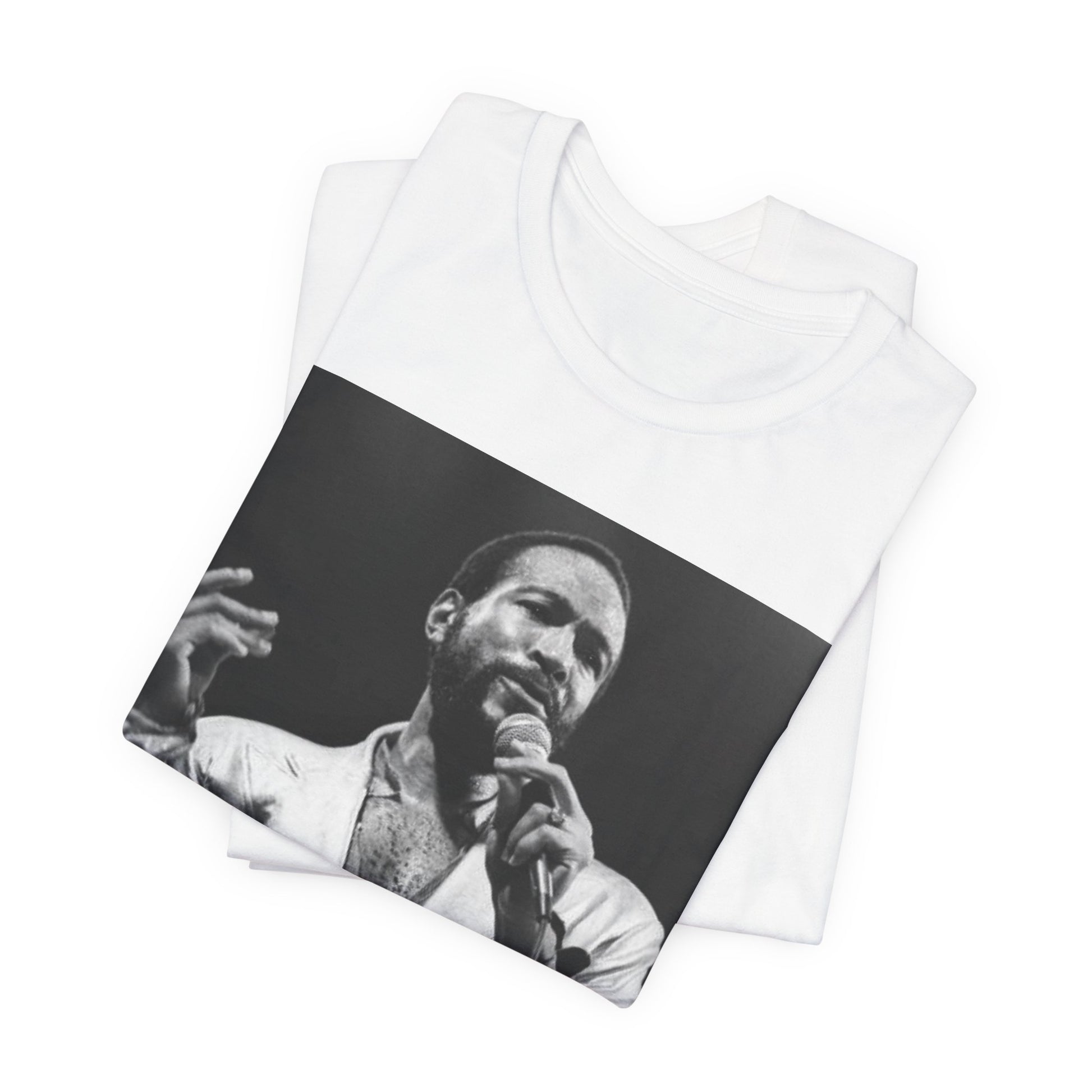 A black graphic t-shirt featuring a retro black and white photo or graphic of Marvin Gaye performing live on stage.