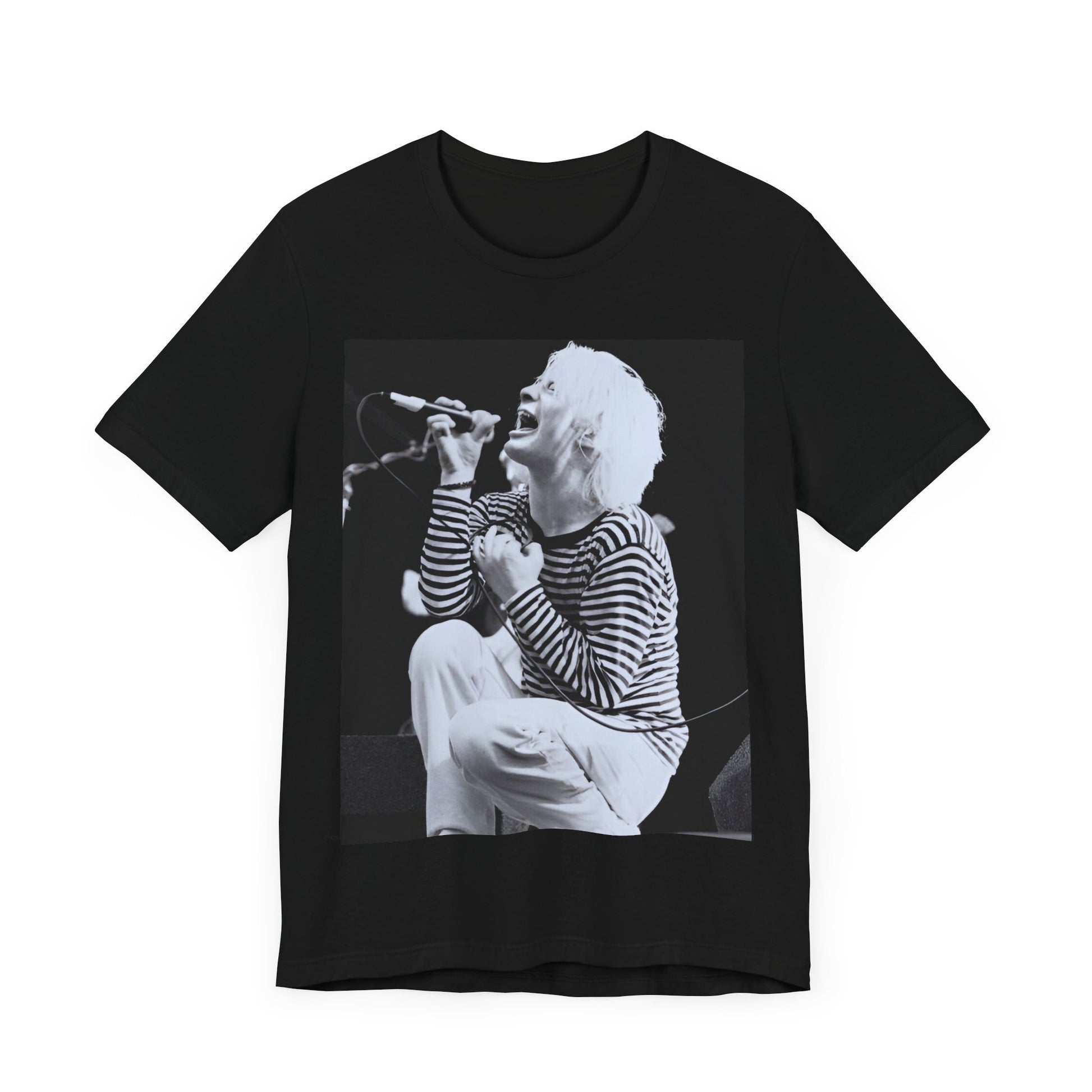 A black graphic t-shirt featuring a black and white graphic or photo of Radiohead performing live.