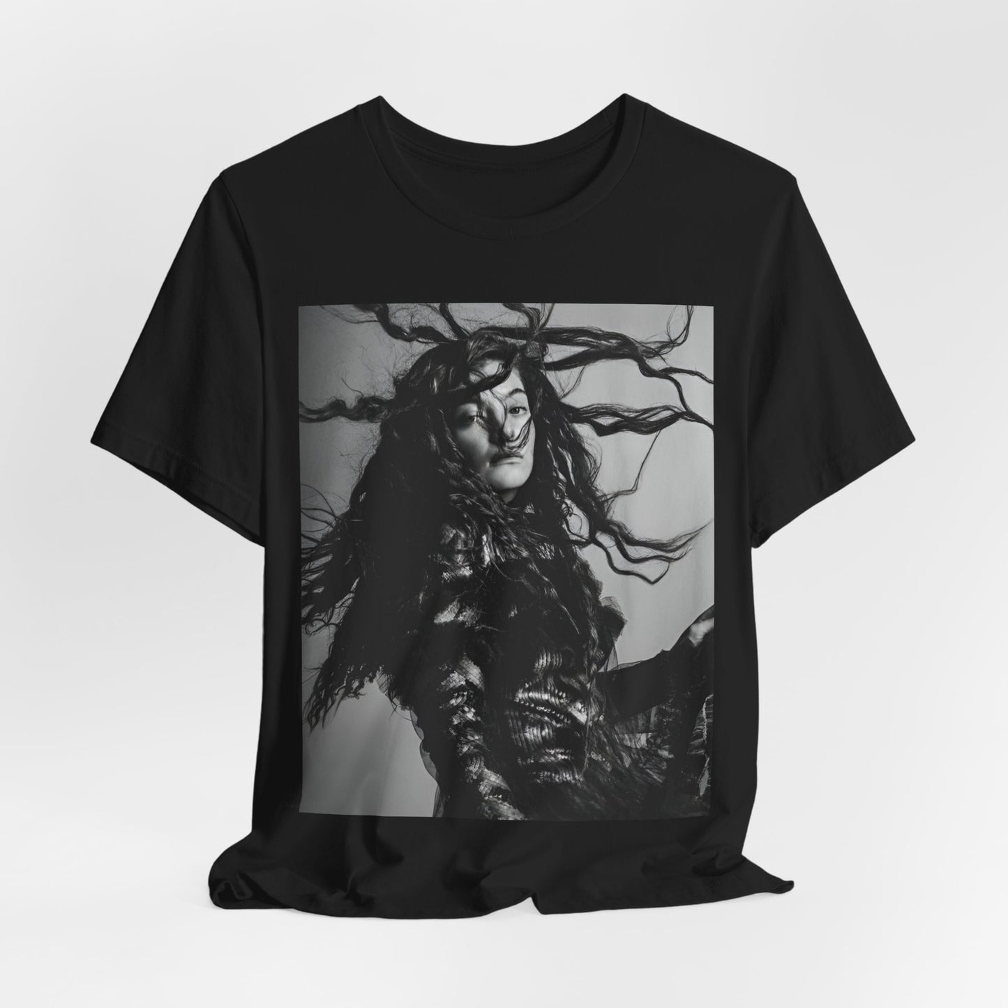 A black graphic t-shirt featuring a black and white retro photo or graphic of Lorde.