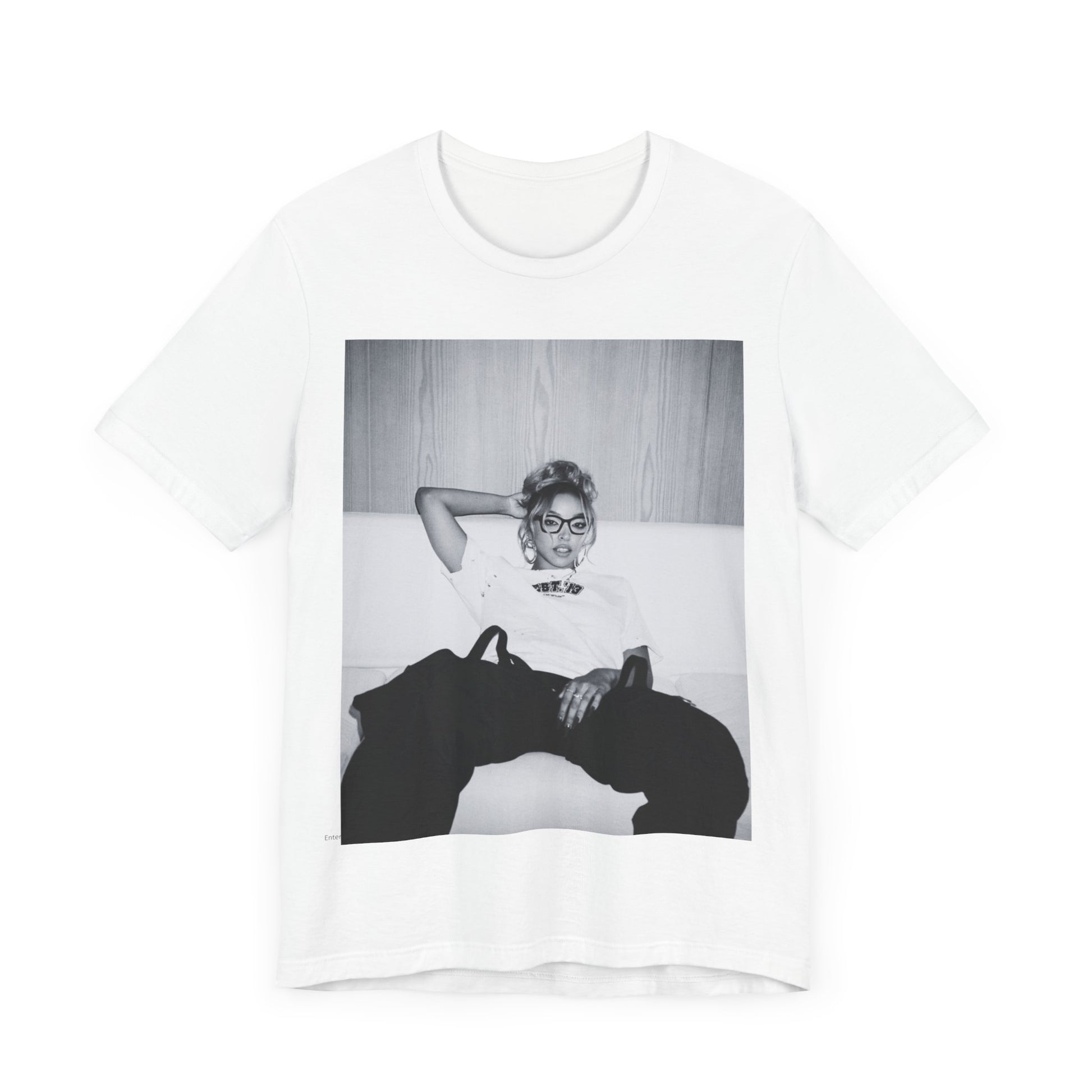 A black graphic t-shirt featuring a black and white portrait photo of Tinashe.