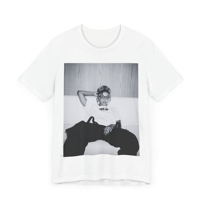 A black graphic t-shirt featuring a black and white portrait photo of Tinashe.