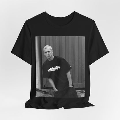 A black graphic t-shirt featuring a graphic of Eminem with a Detroit hip hop aesthetic.