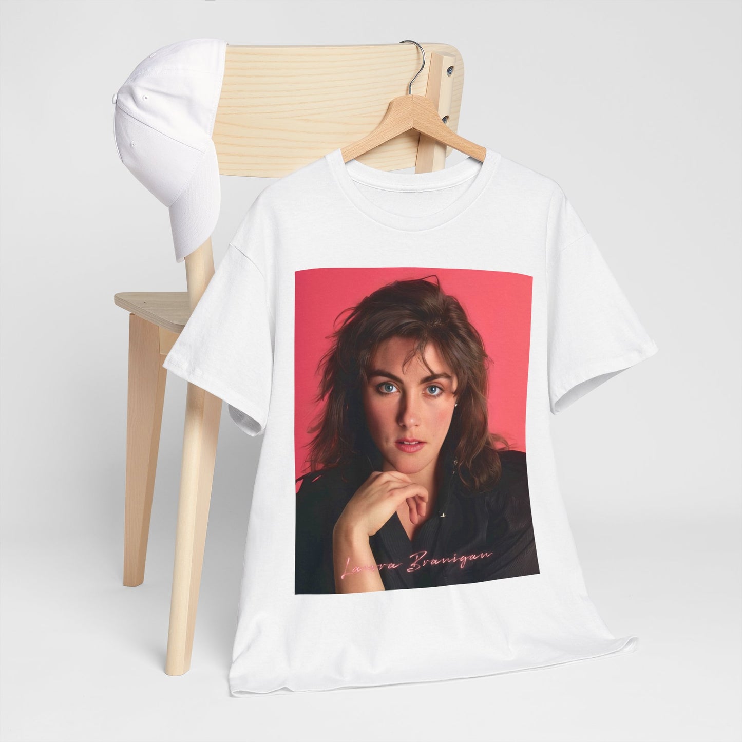A black graphic t-shirt featuring a vintage 80s pop diva graphic of Laura Branigan.
