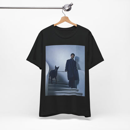 A black graphic t-shirt featuring a photo of The Weeknd with a doberman.