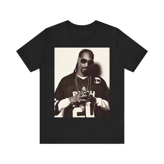 A black graphic t-shirt featuring a black and white, monochrome graphic or photo of Snoop Dogg in an OG style.