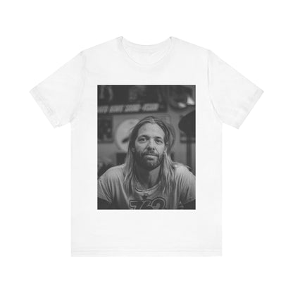 A black graphic t-shirt featuring a tribute graphic for Taylor Hawkins of Foo Fighters.