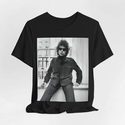 A black graphic t-shirt featuring a graphic related to Bob Dylan's 'Highway 61' era, possibly with album art elements or iconic imagery.