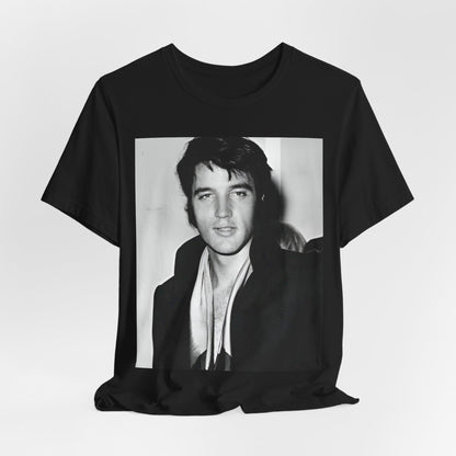 A black graphic t-shirt featuring a black and white rock and roll portrait photo of Elvis Presley.