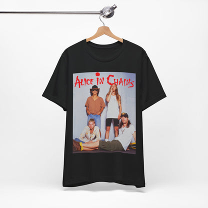 A black graphic t-shirt featuring a band graphic of Alice In Chains from 1990, capturing their early grunge aesthetic.