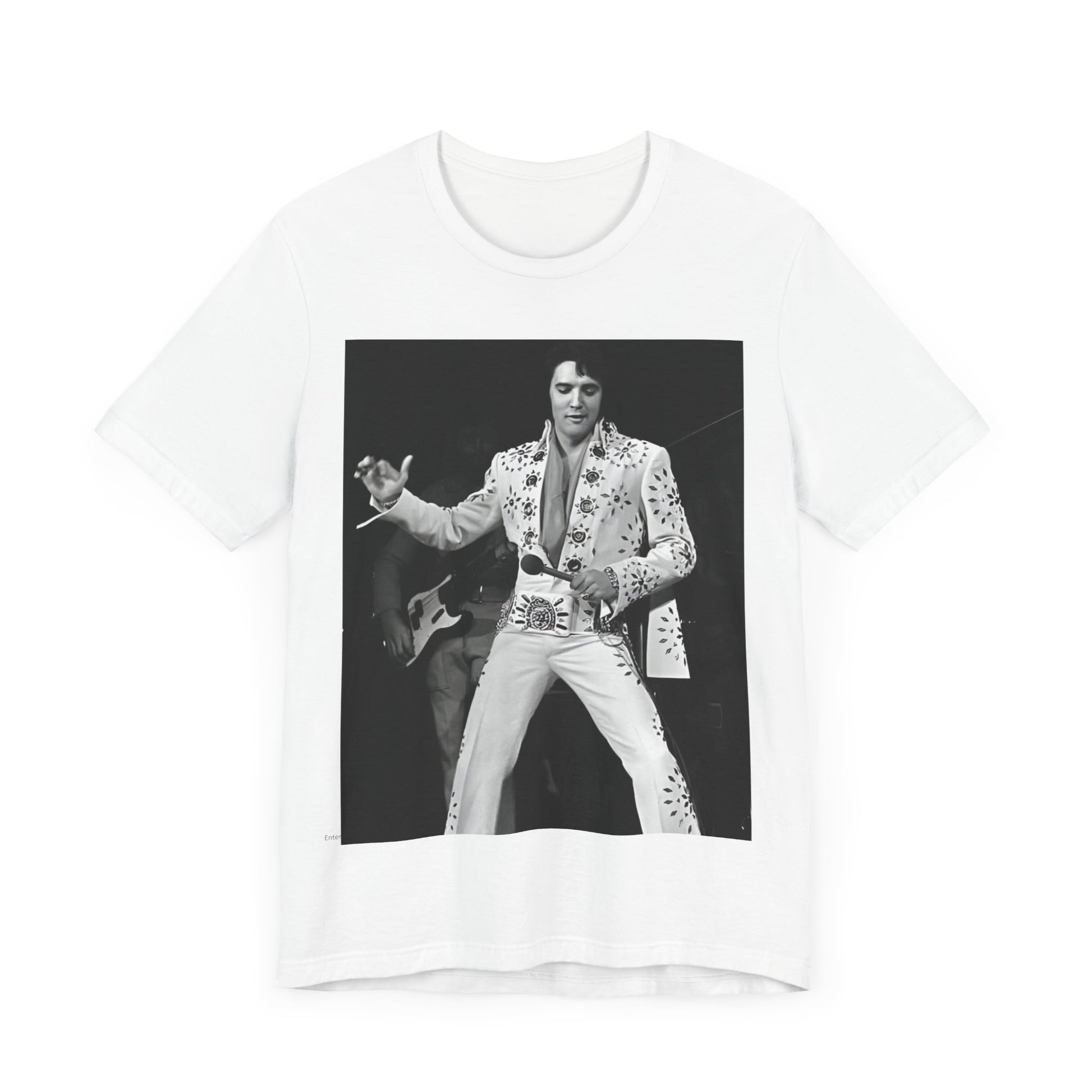 A black graphic t-shirt featuring a stylized graphic of Elvis Presley as The King of Rock 'n' Roll.
