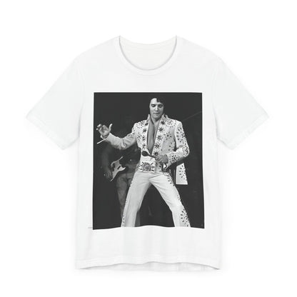 A black graphic t-shirt featuring a stylized graphic of Elvis Presley as The King of Rock 'n' Roll.