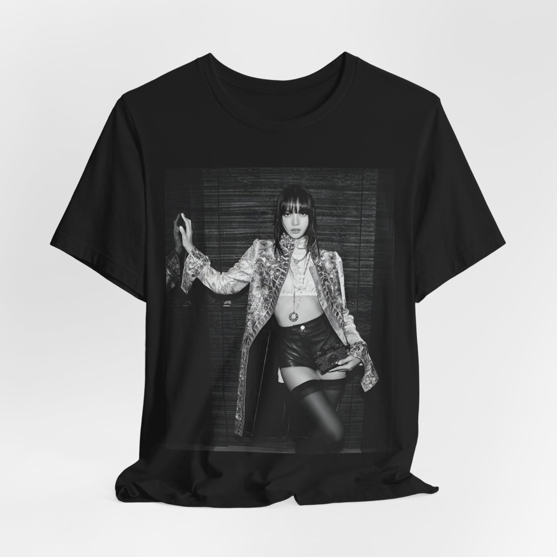 A black graphic t-shirt featuring a black and white, monochrome graphic or photo of Lisa.
