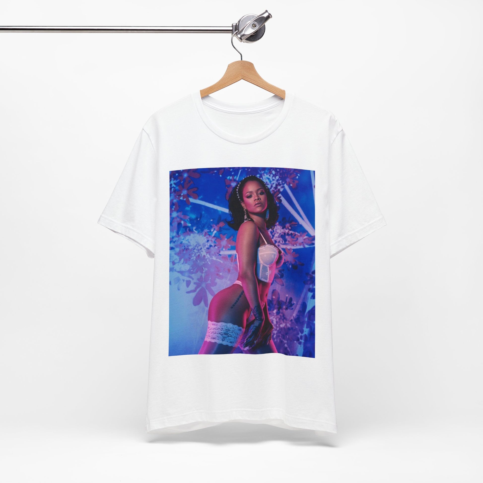 A black graphic t-shirt featuring a graphic of Rihanna as a lingerie goddess.