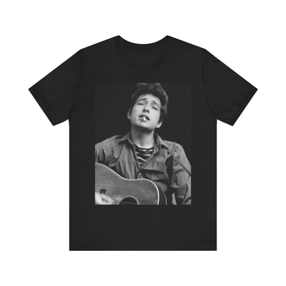 A black graphic t-shirt featuring a photo of Bob Dylan with his acoustic guitar.