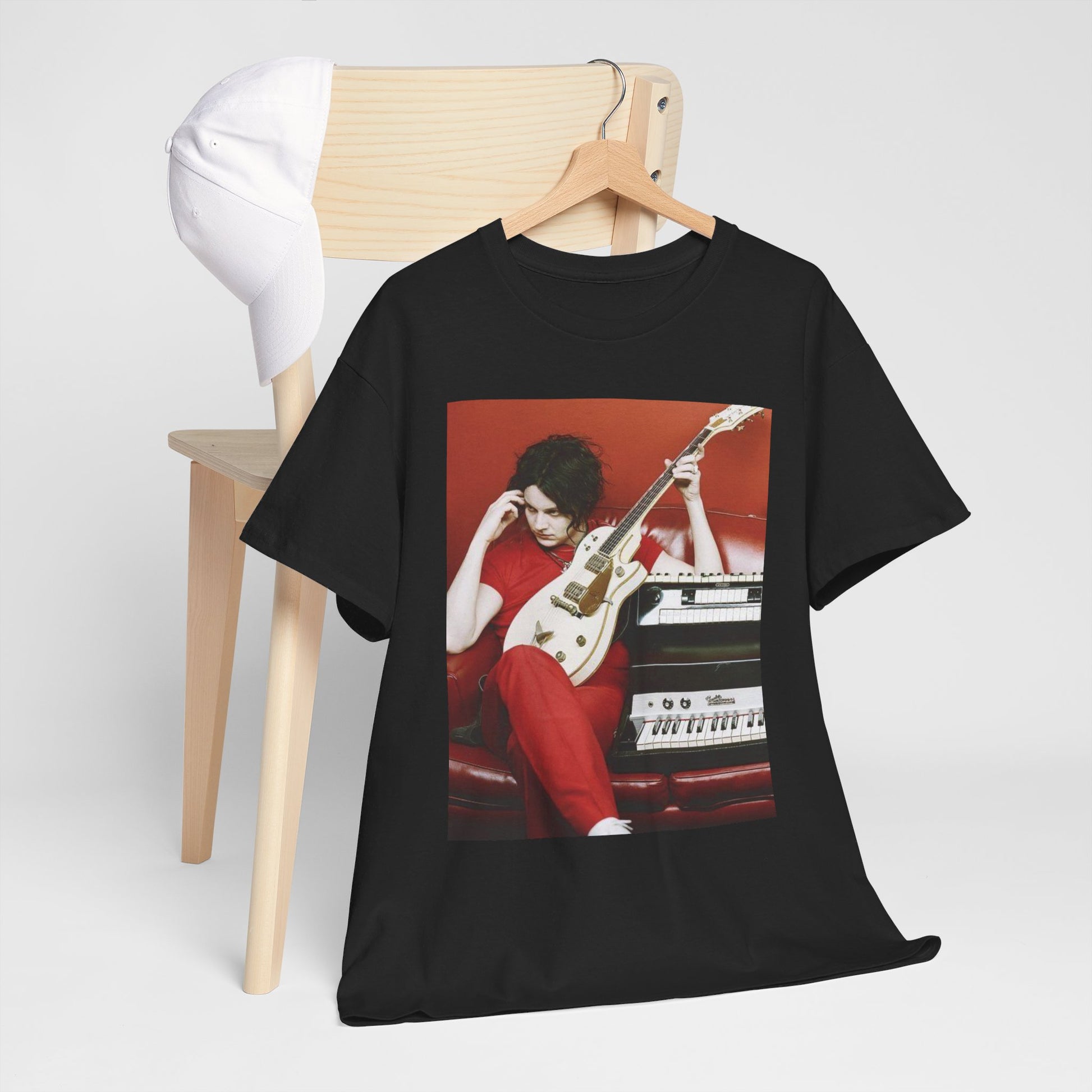 A black graphic t-shirt featuring a retro graphic of The White Stripes with a garage rock aesthetic.