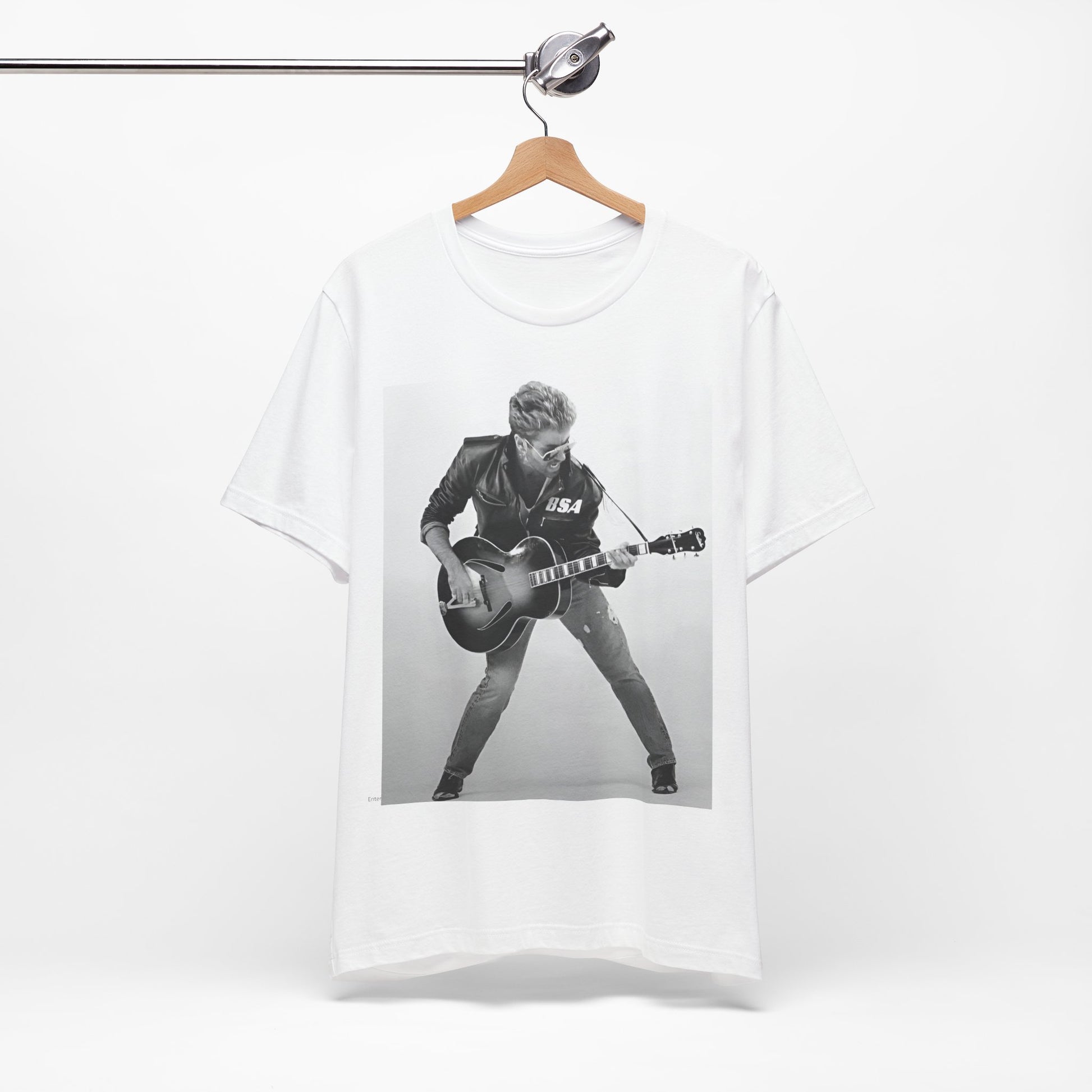 A black graphic t-shirt featuring a graphic of George Michael with a guitar.