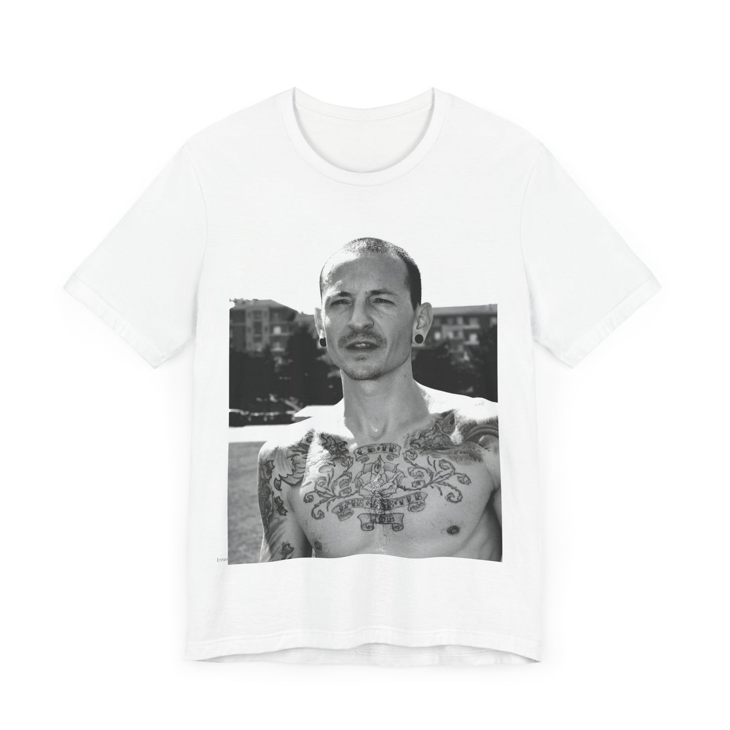 A black graphic t-shirt featuring a black and white graphic or photo portrait of Chester Bennington from Linkin Park.