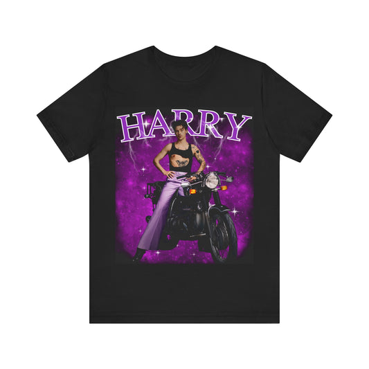 A black graphic t-shirt featuring a neon bootleg graphic of Harry Styles.