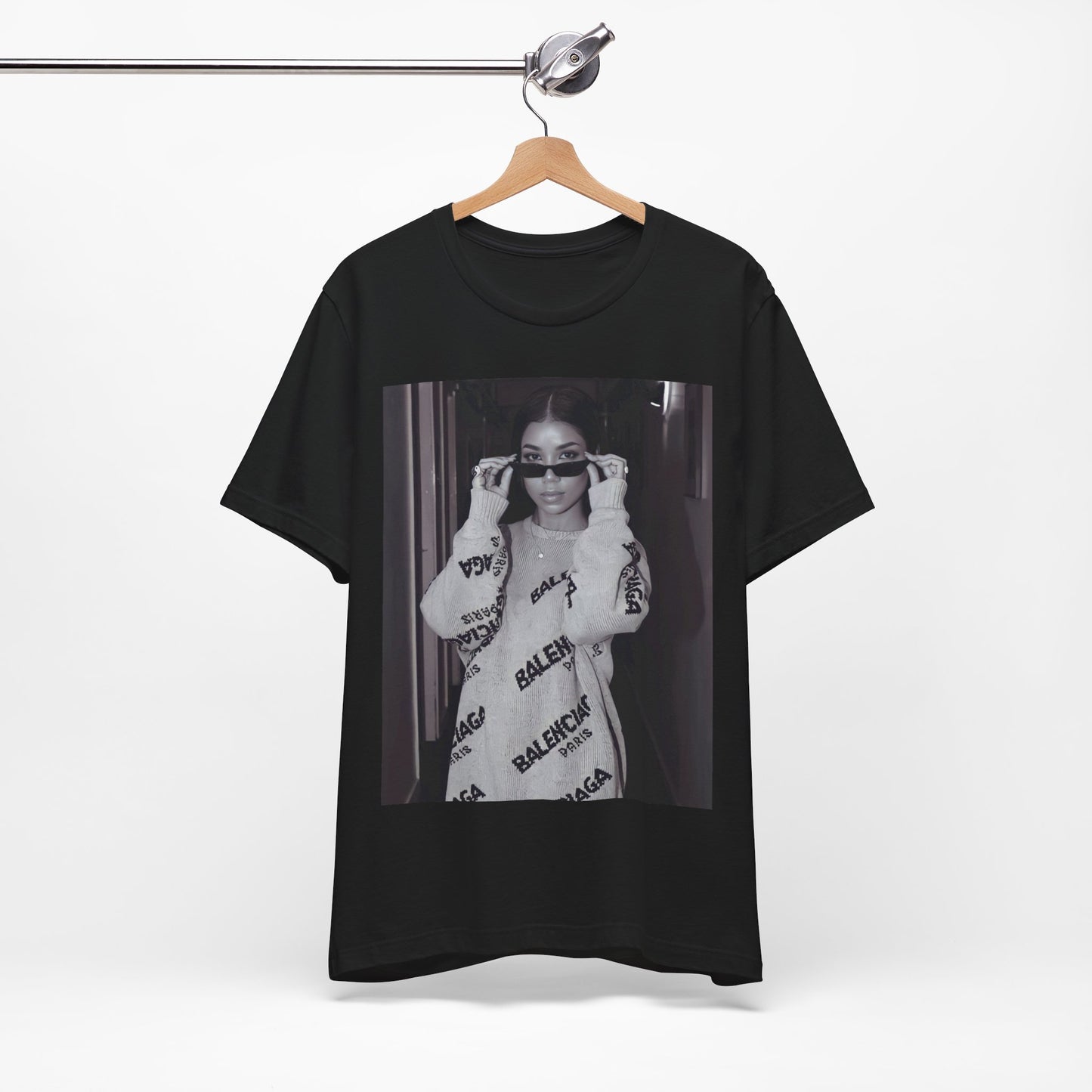 A black graphic t-shirt featuring a black and white, monochrome graphic or photo of Jhene Aiko.
