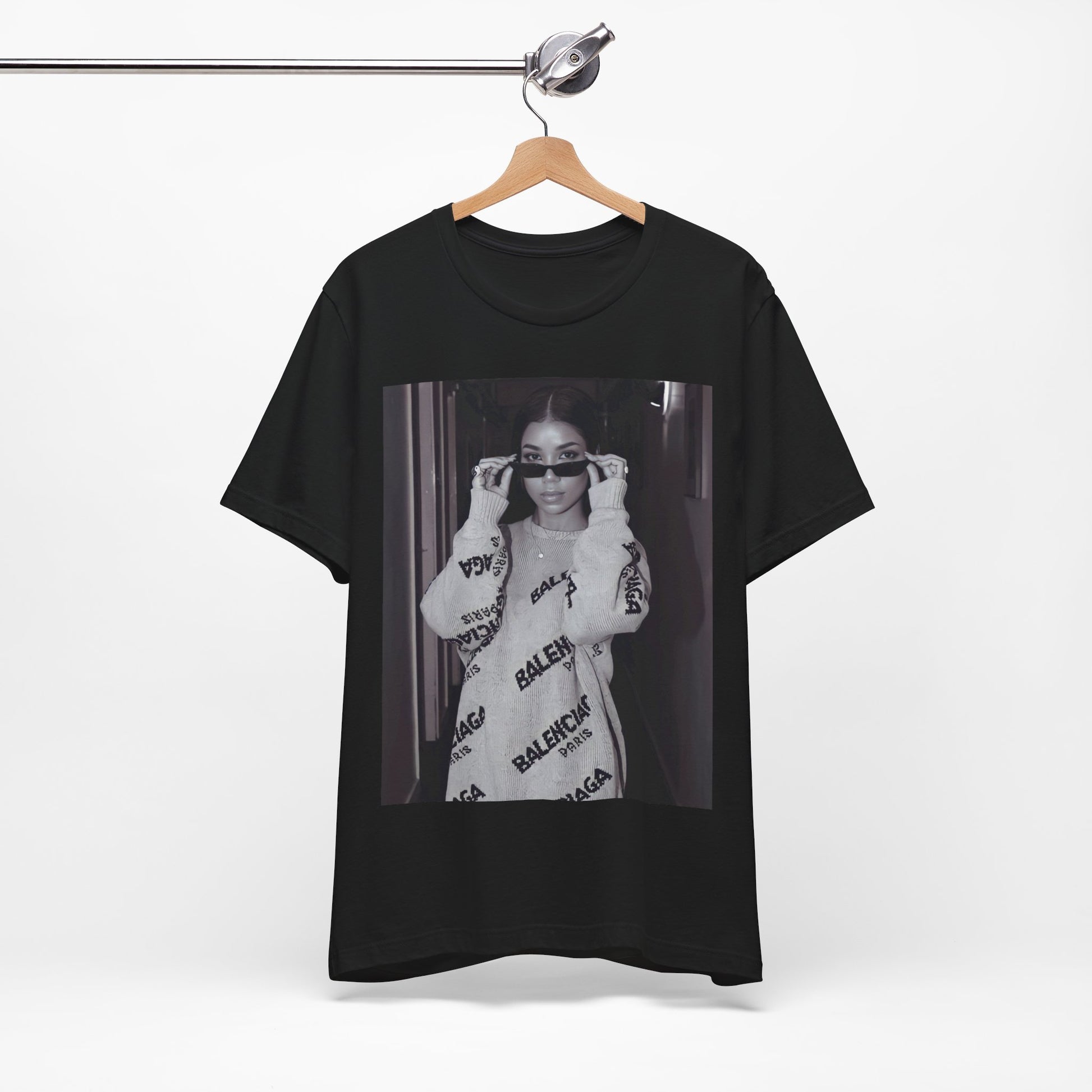 A black graphic t-shirt featuring a black and white, monochrome graphic or photo of Jhene Aiko.