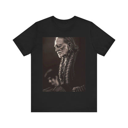 A black graphic t-shirt featuring a vintage country legend graphic of Willie Nelson.
