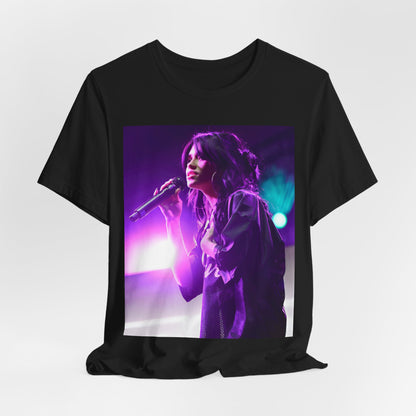 A black graphic t-shirt featuring a graphic or photo of Nessa Barrett performing live on stage.
