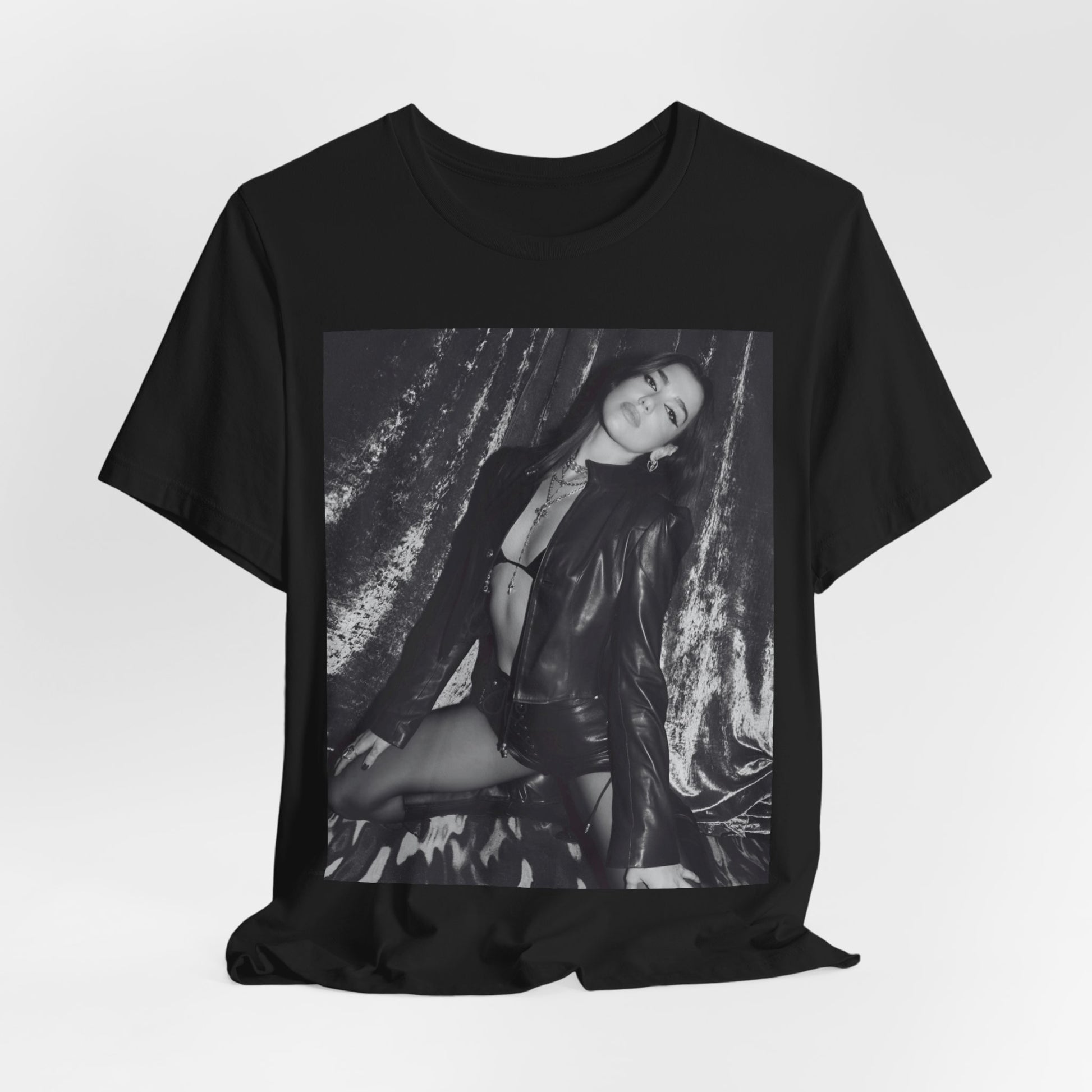 A black graphic t-shirt featuring a black and white portrait photo of Dua Lipa.