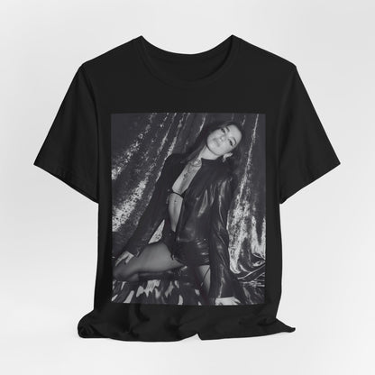 A black graphic t-shirt featuring a black and white portrait photo of Dua Lipa.