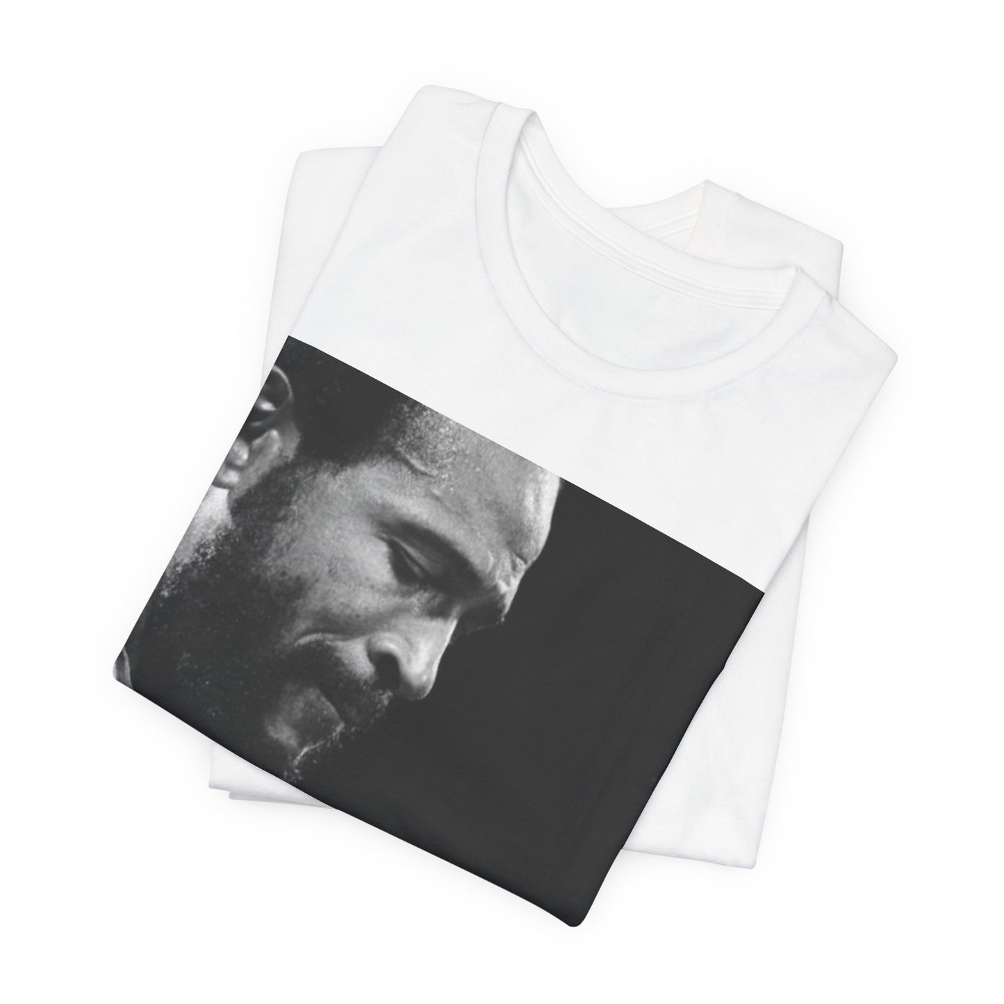 A black graphic t-shirt featuring a 70s graphic of Marvin Gaye emphasizing his soulful voice.