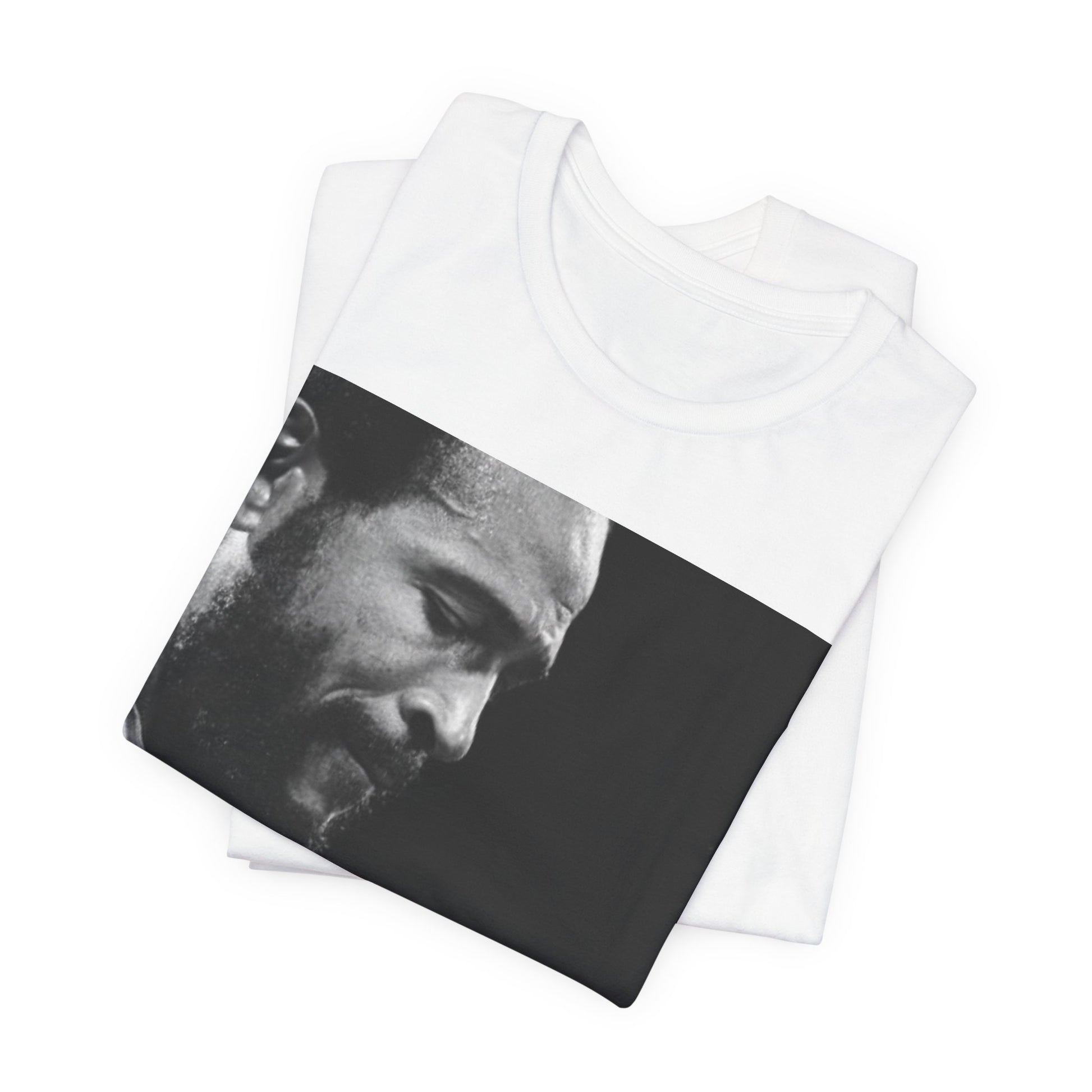 A black graphic t-shirt featuring a 70s graphic of Marvin Gaye emphasizing his soulful voice.