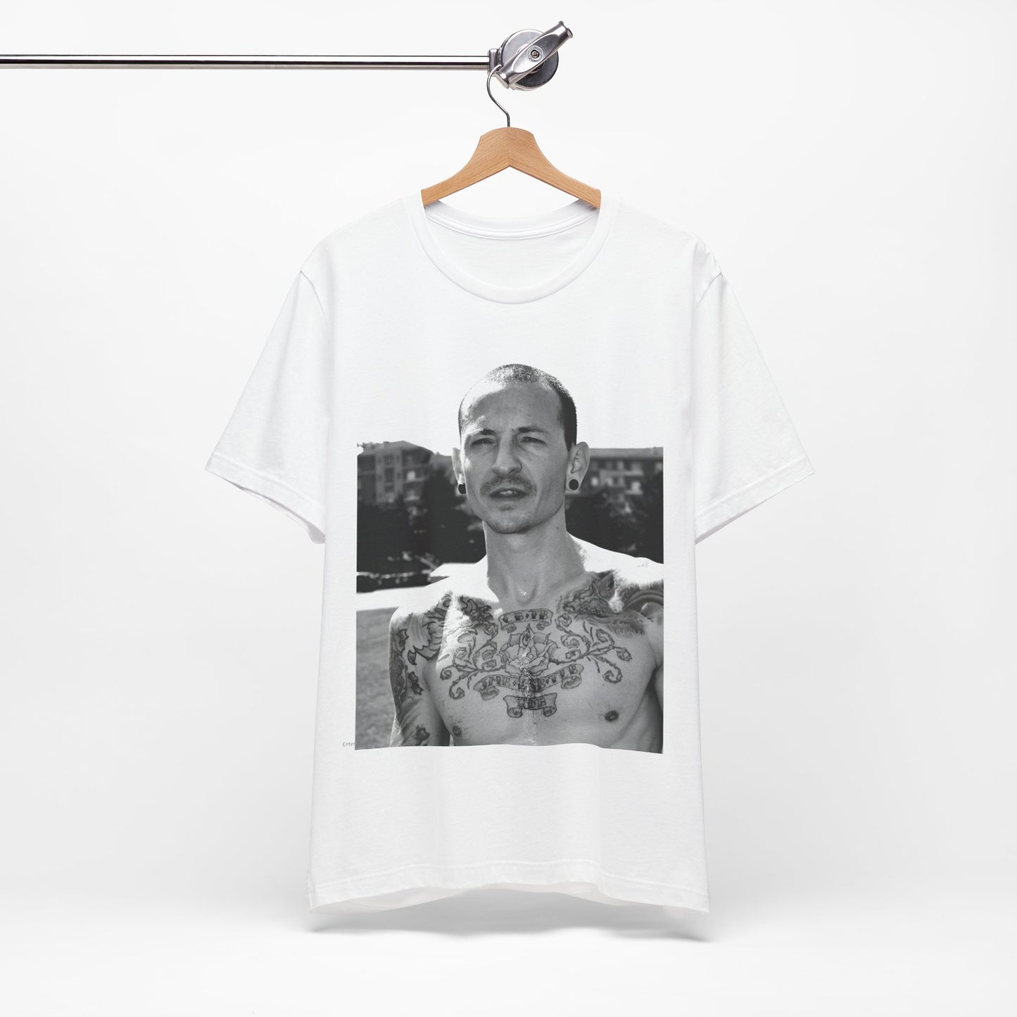 A black graphic t-shirt featuring a black and white graphic or photo portrait of Chester Bennington from Linkin Park.