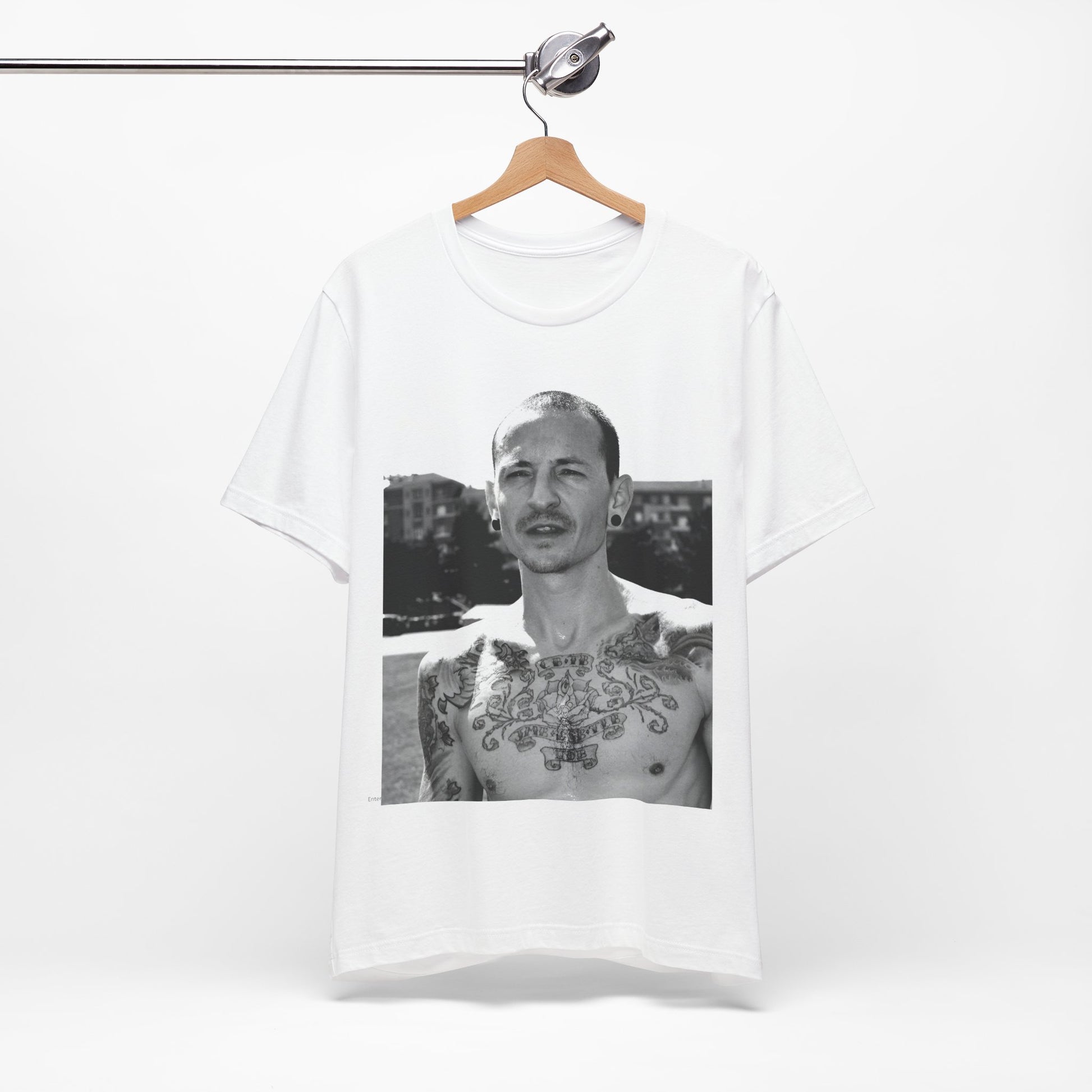 A black graphic t-shirt featuring a black and white graphic or photo portrait of Chester Bennington from Linkin Park.
