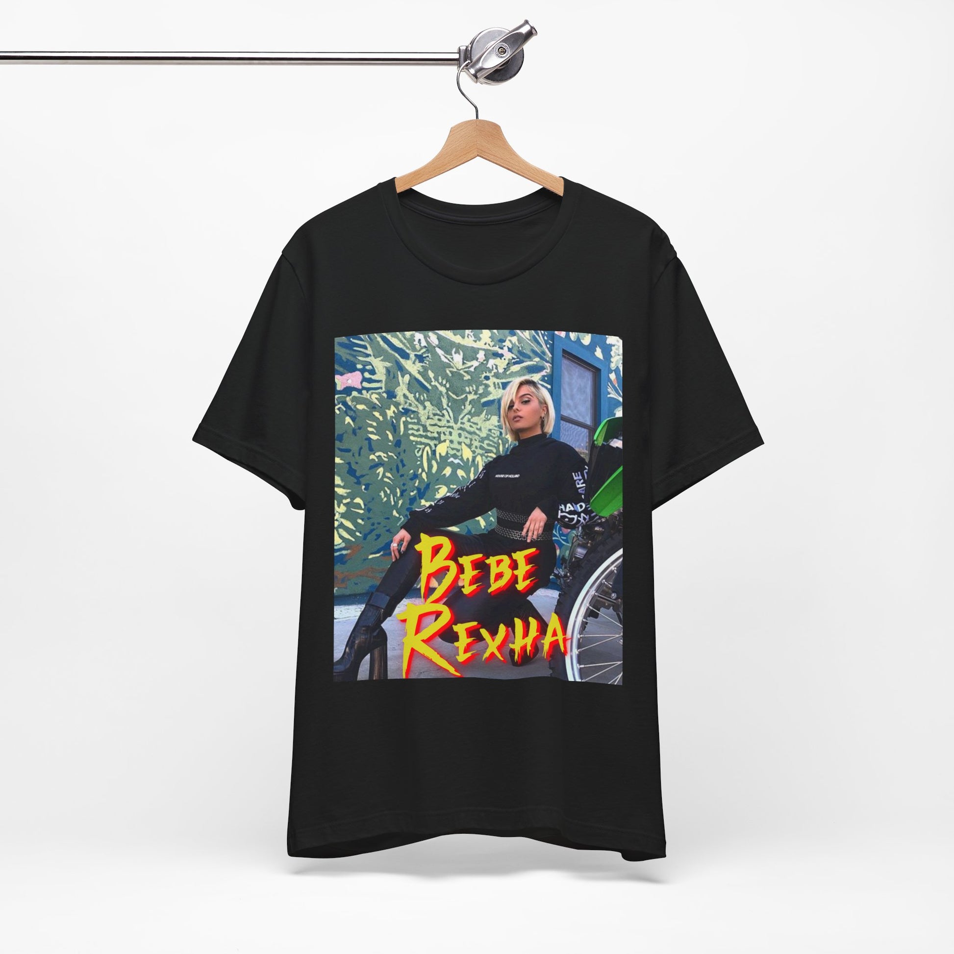 A black graphic t-shirt featuring a vintage pop aesthetic graphic of Bebe Rexha.