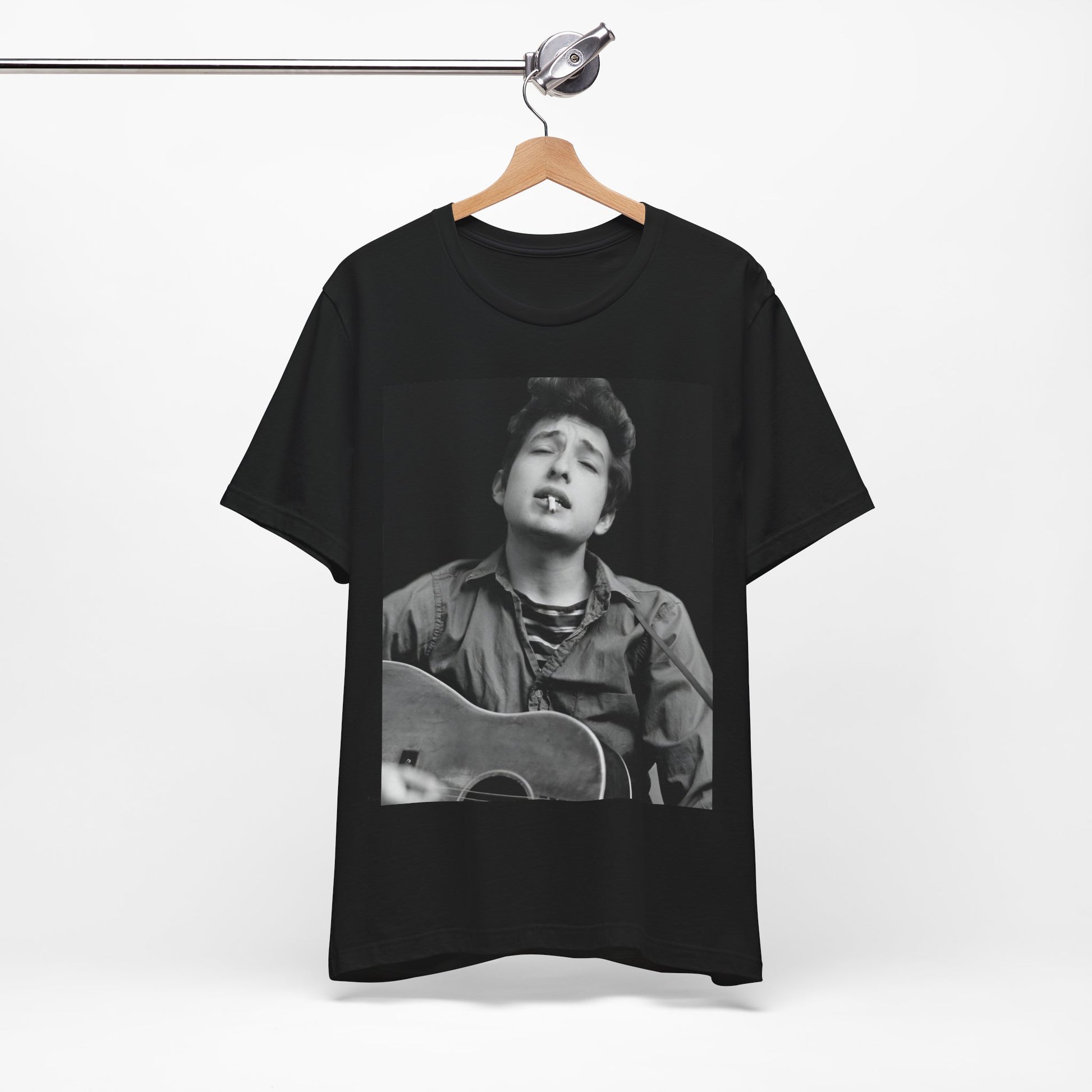 A black graphic t-shirt featuring a photo of Bob Dylan with his acoustic guitar.