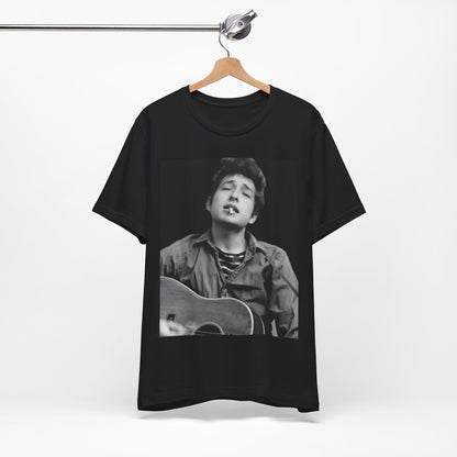 A black graphic t-shirt featuring a photo of Bob Dylan with his acoustic guitar.