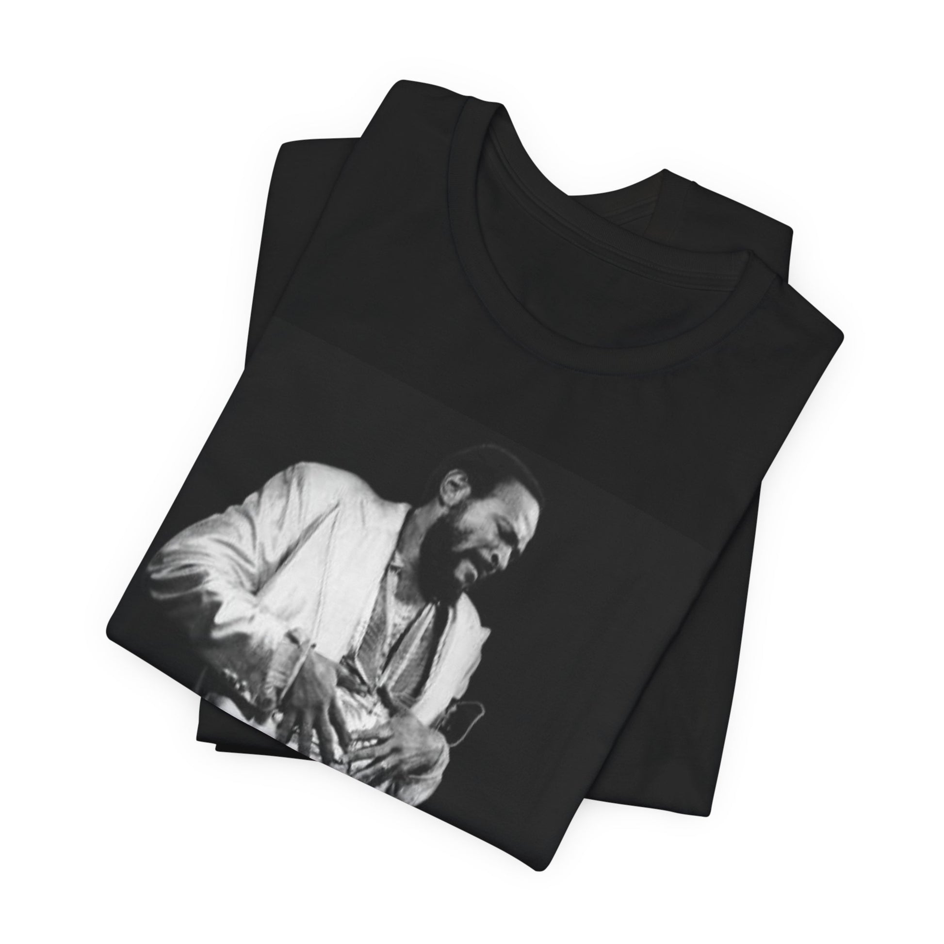 A black graphic t-shirt featuring a 70s Motown concert graphic of Marvin Gaye.