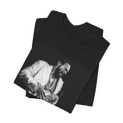 A black graphic t-shirt featuring a 70s Motown concert graphic of Marvin Gaye.