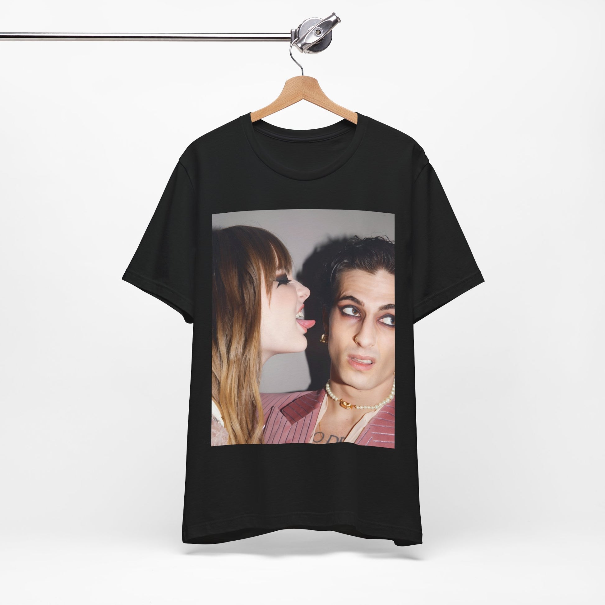 A black graphic t-shirt featuring a fearless rock and roll graphic of Maneskin.