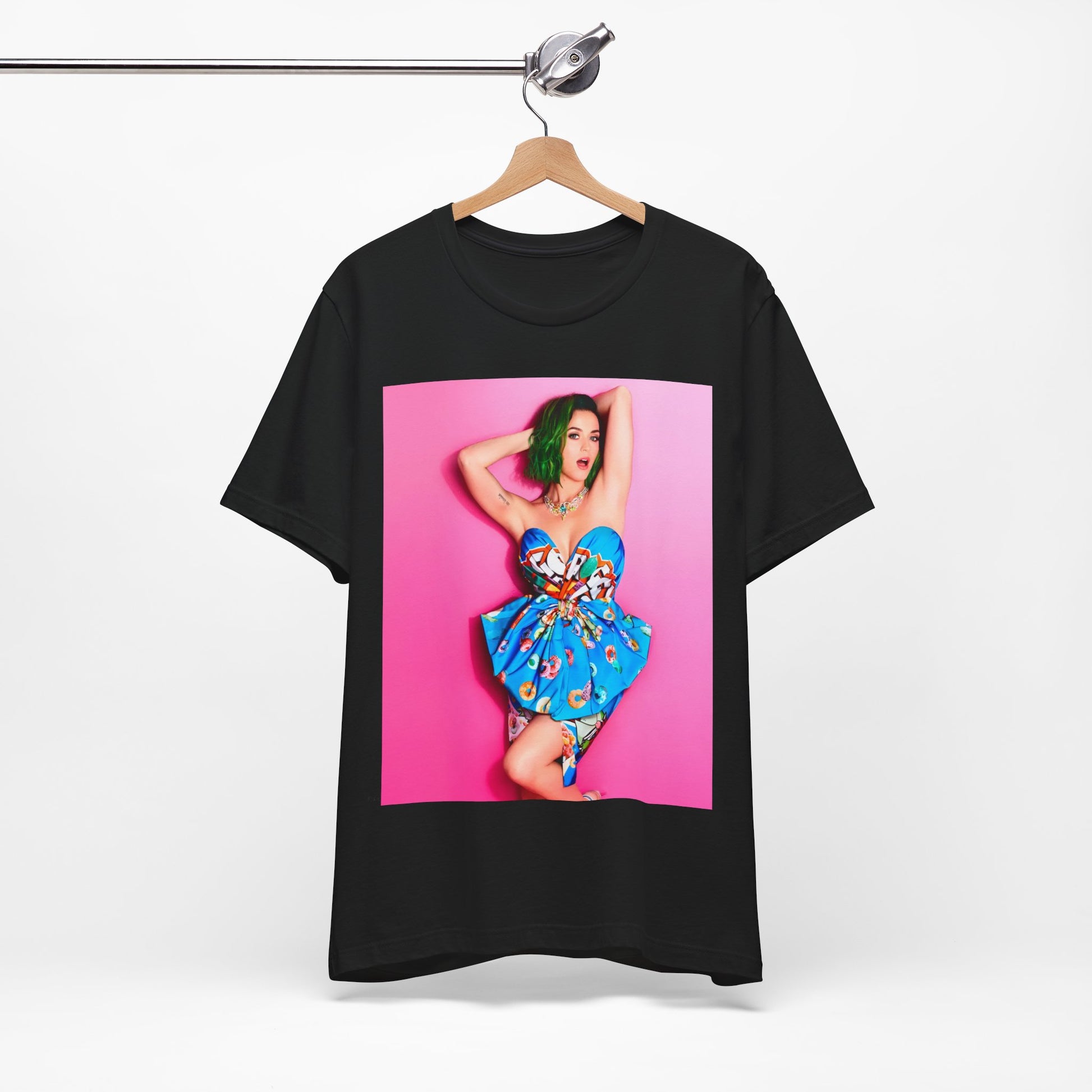 A black graphic t-shirt featuring a graphic related to Katy Perry's 'Dark Horse' song or era.