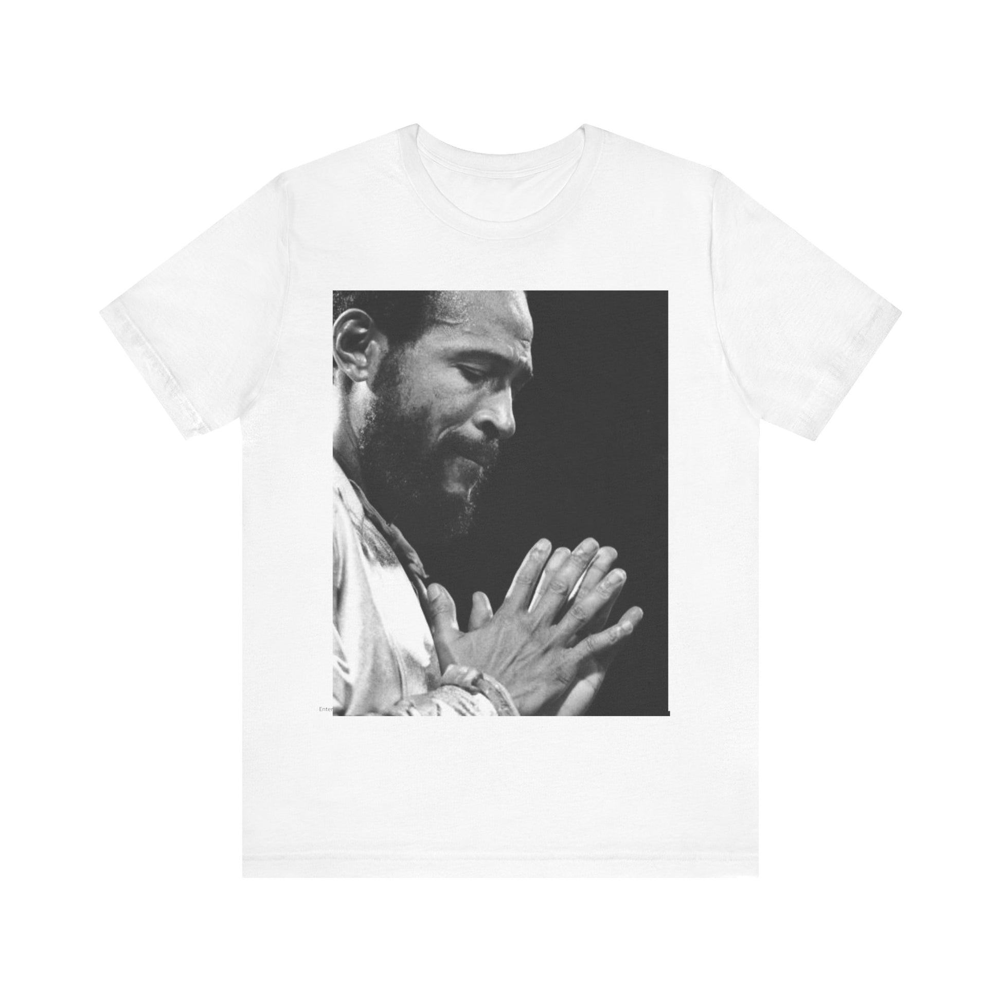 A black graphic t-shirt featuring a 70s graphic of Marvin Gaye emphasizing his soulful voice.