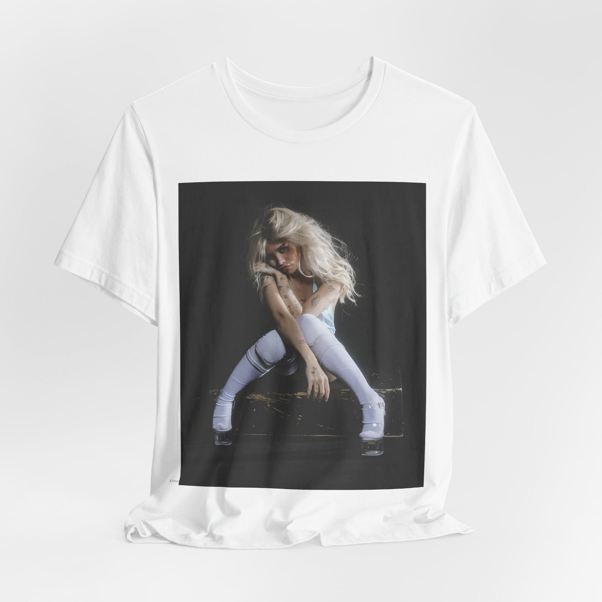 A black graphic t-shirt featuring a graphic of Nessa Barrett with dark pop vibes aesthetic.