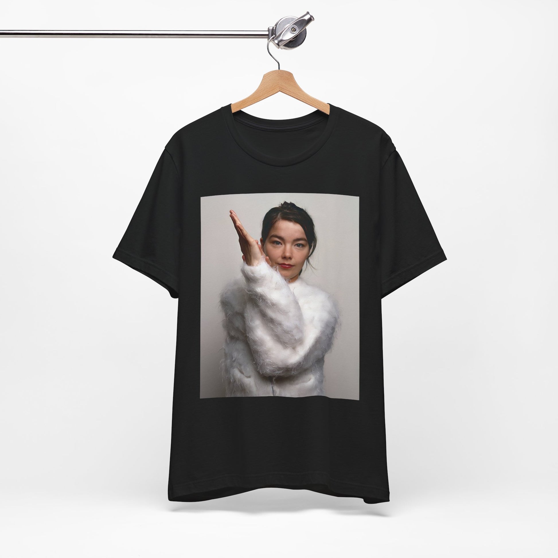 A black graphic t-shirt featuring a classic indie music graphic of Bjork.