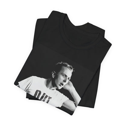 A black graphic t-shirt featuring a black and white graphic or photo portrait of Joe Strummer from The Clash.